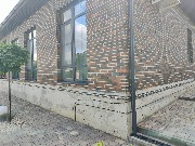 Мы приступили к утеплению и отделке цоколя частного дома декоративной штукатуркой мраморная крошка