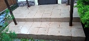 Завершён монтаж керамогранитной плитки во дворе частного дома