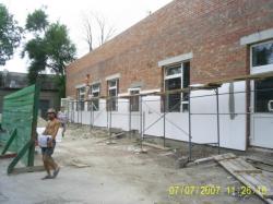 Произведены фасадные работы по утеплению стен и декоративной отделке стен короедом.