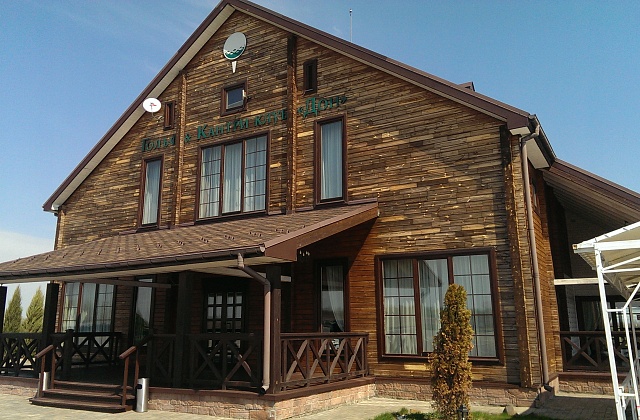 Покраска фасада деревянного дома